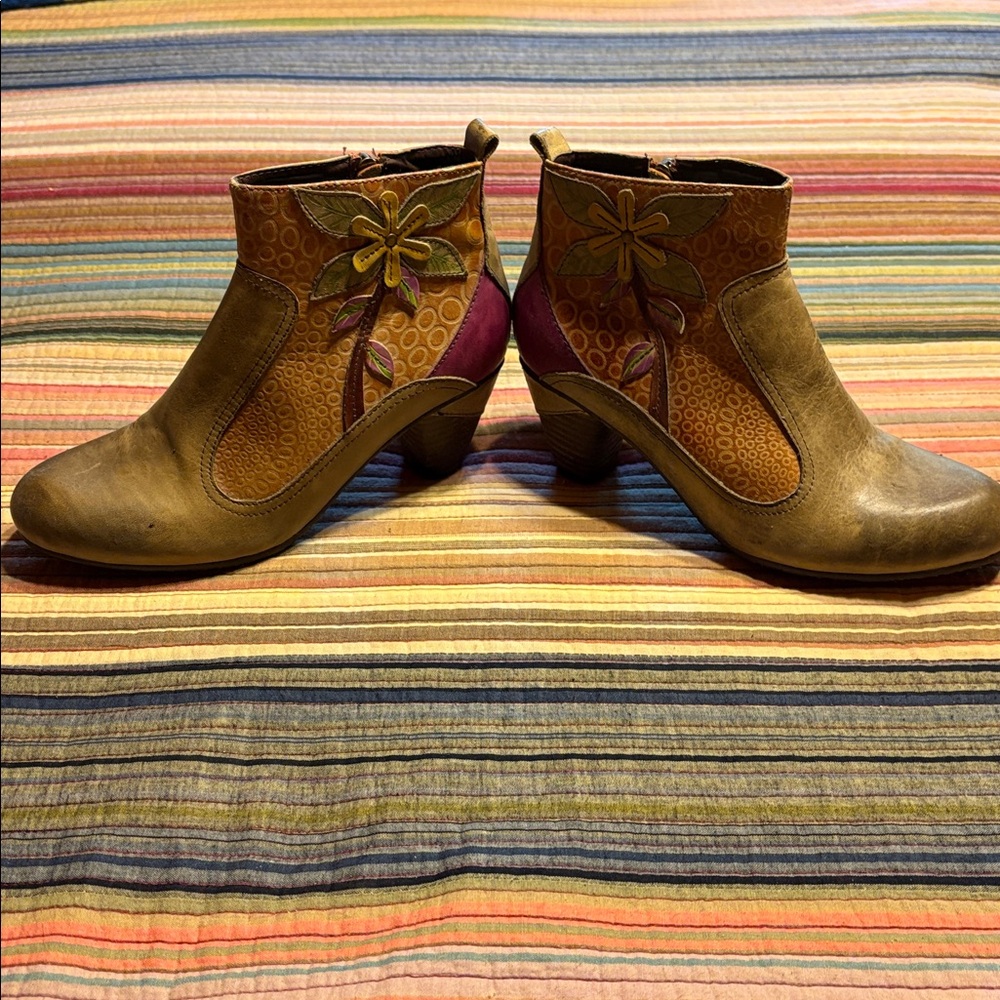 L’Artiste Spring Step Bootie with flower appliqué.